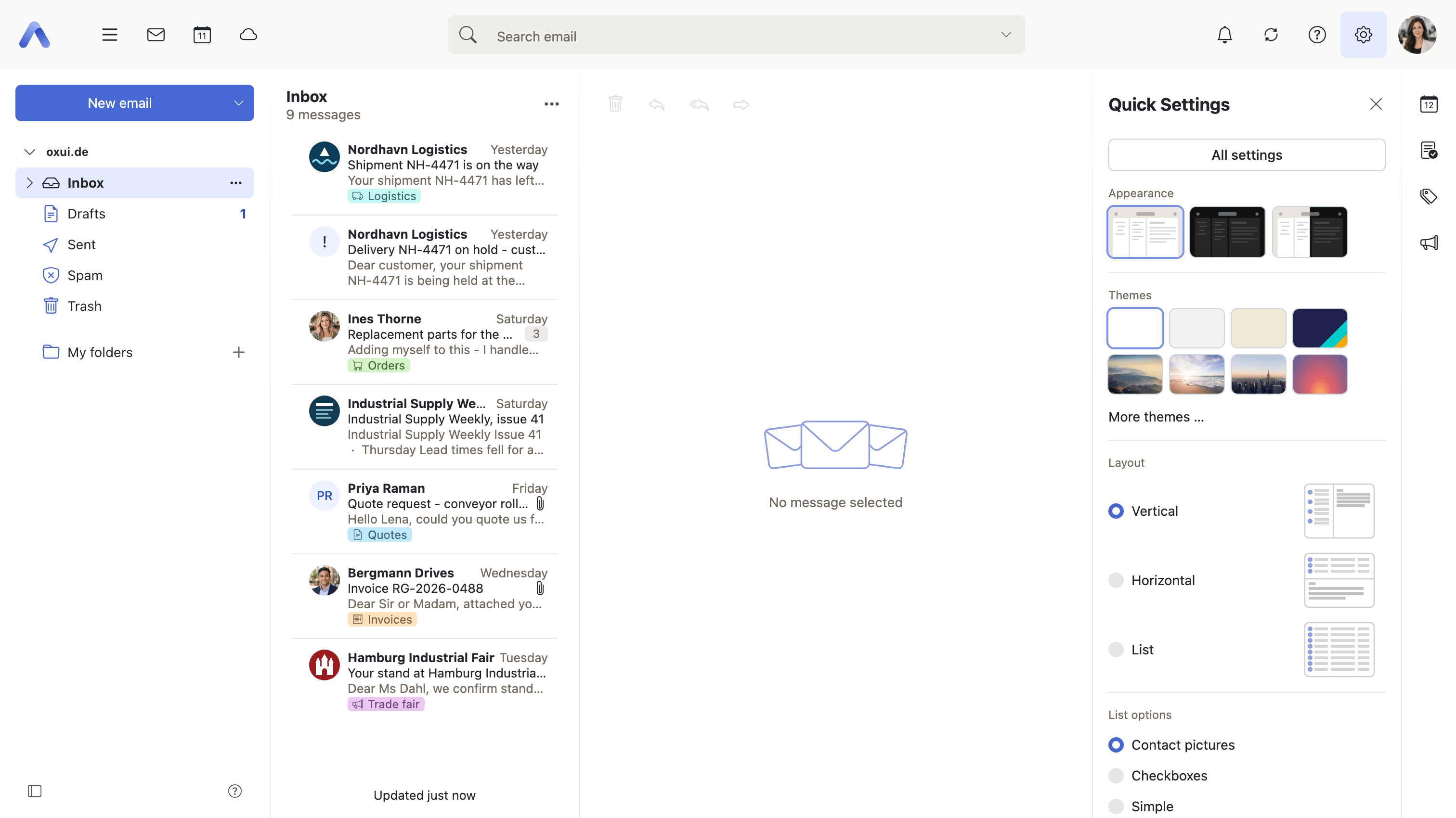 The Quick Settings panel open beside the mail list, holding the view options and the theme controls