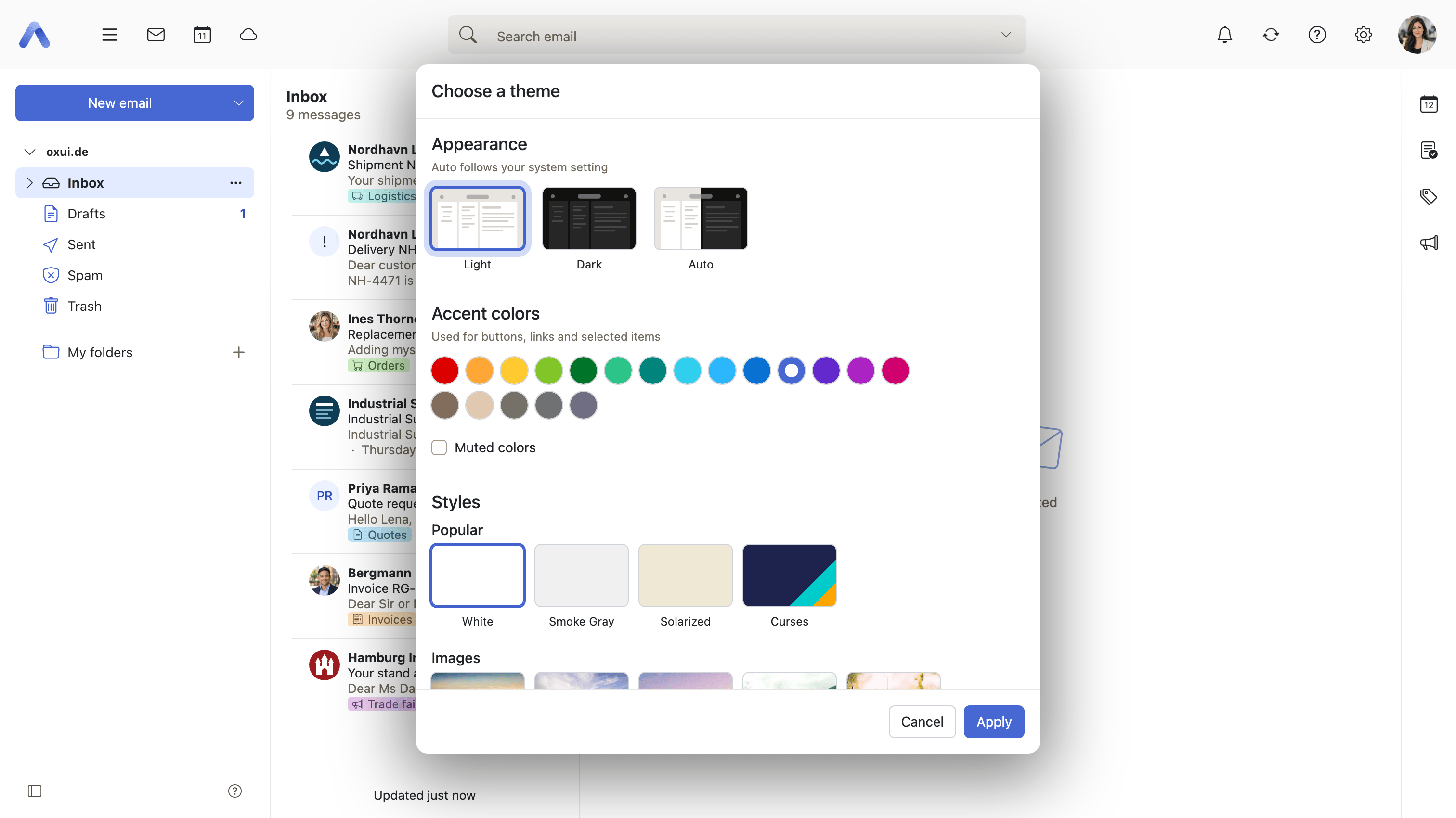 The theme picker, open over the mail window